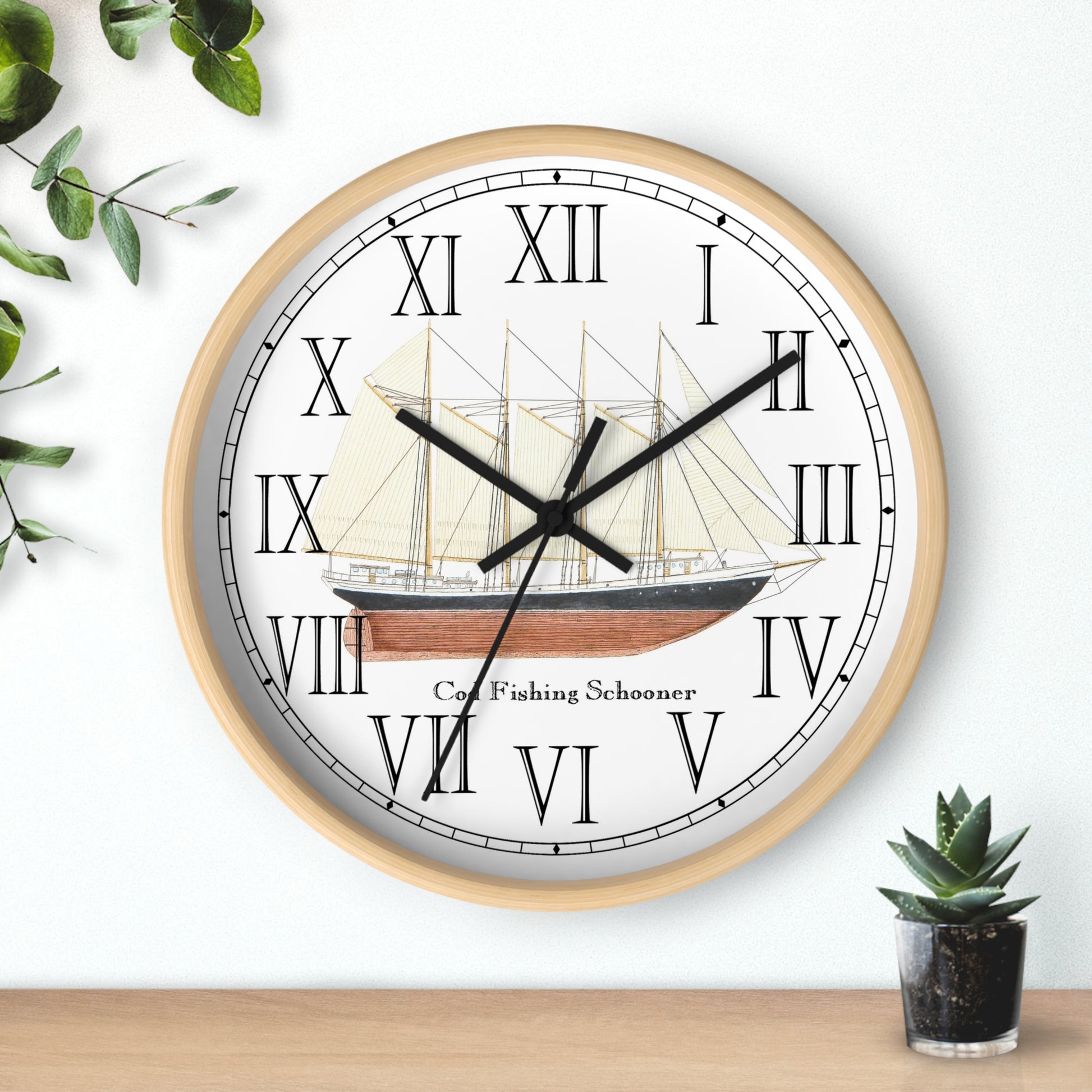 The Atlantic Pearl Cod Fishing Schooner Roman Numeral Clock will ad a classic touch to any room.