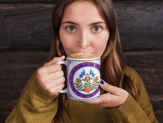 A delightful Pennsylvania Dutch design adds folk art charm to this decorative mug. Shop today!
