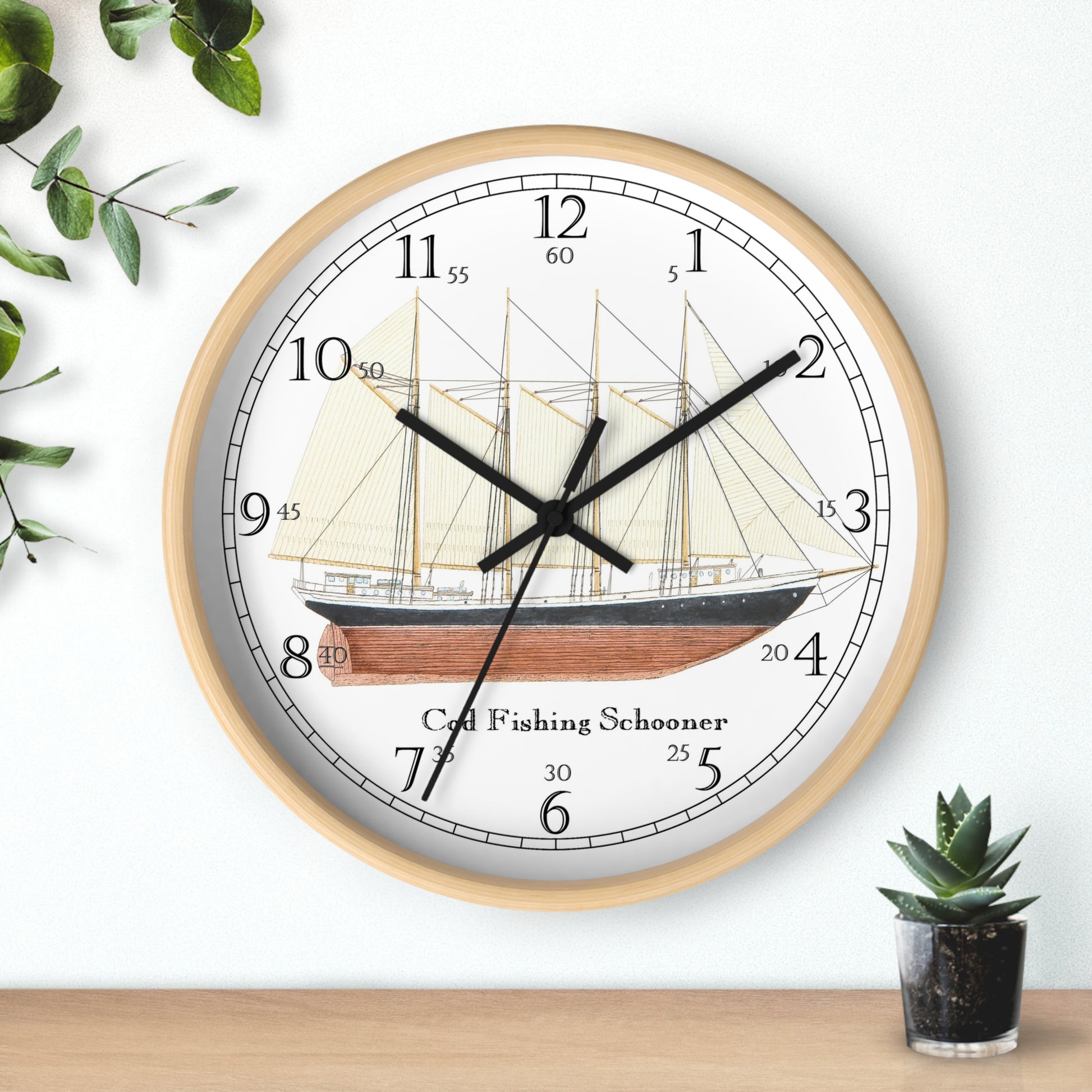 The Atlantic Pearl Cod Fishing Schooner English Numeral Clock will add a special touch to any room.