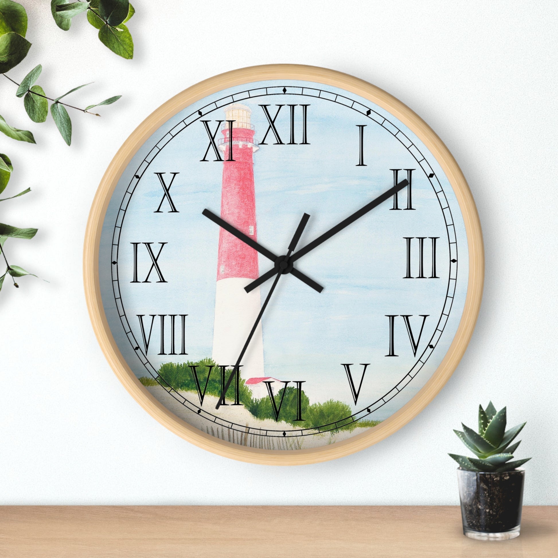The Barnegat Lighthouse Roman Numeral Clock  will add a nautical touch to any room.