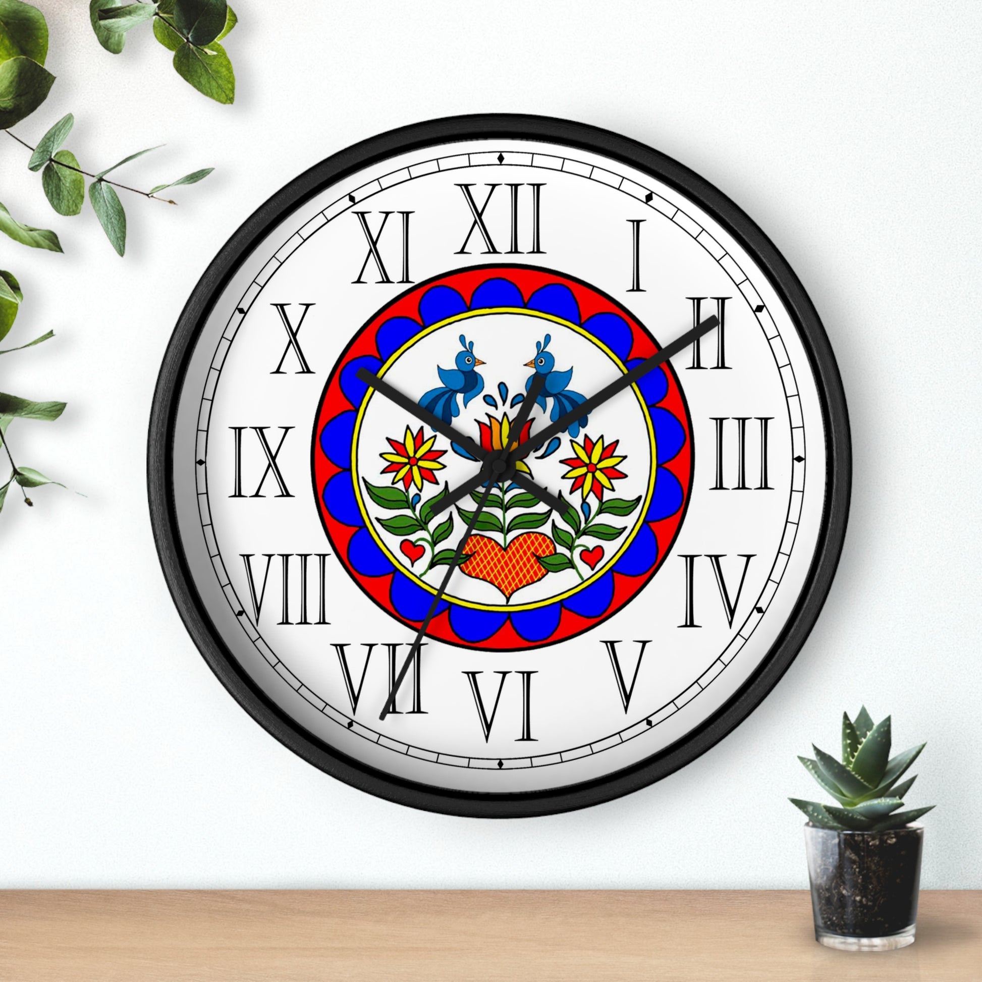 A delightful Pennsylvania Dutch design adds folk art charm to this decorative English Numeral Clock. Shop today!