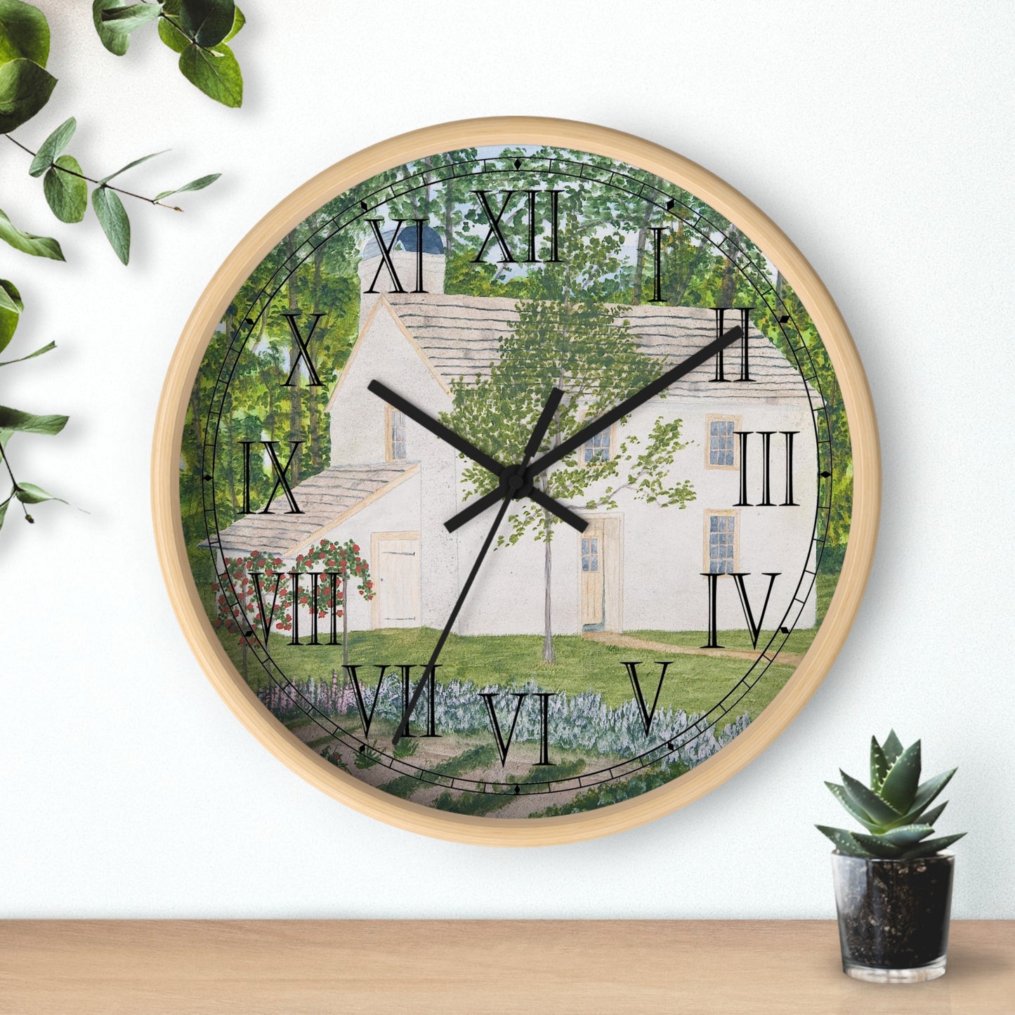 The Country Garden Roman Numeral Clock features a reproduction of a watercolor painting by artist Lee M. Buchanan. This clock will add a class touch to any room in your home.