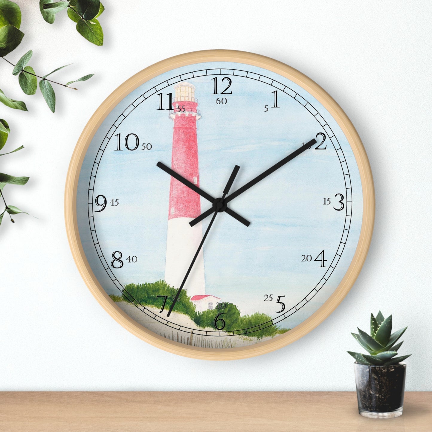 The Barnegat Lighthouse English Numeral Clock will add nautical touch to any room.