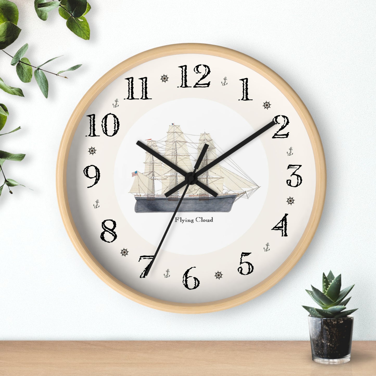 The Clipper Flying Cloud Heirloom Designer Clock features hand-drawn nautical designs between the numbers on the clock. Hang this wall clock  in any room for a unique decorator touch. It makes a great gift for anyone who loves sailing or naval history.